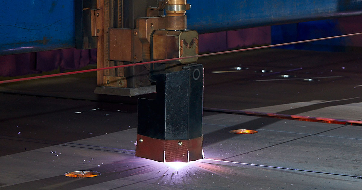 Plasma cutting machine cutting metal at Amber Steel plant.